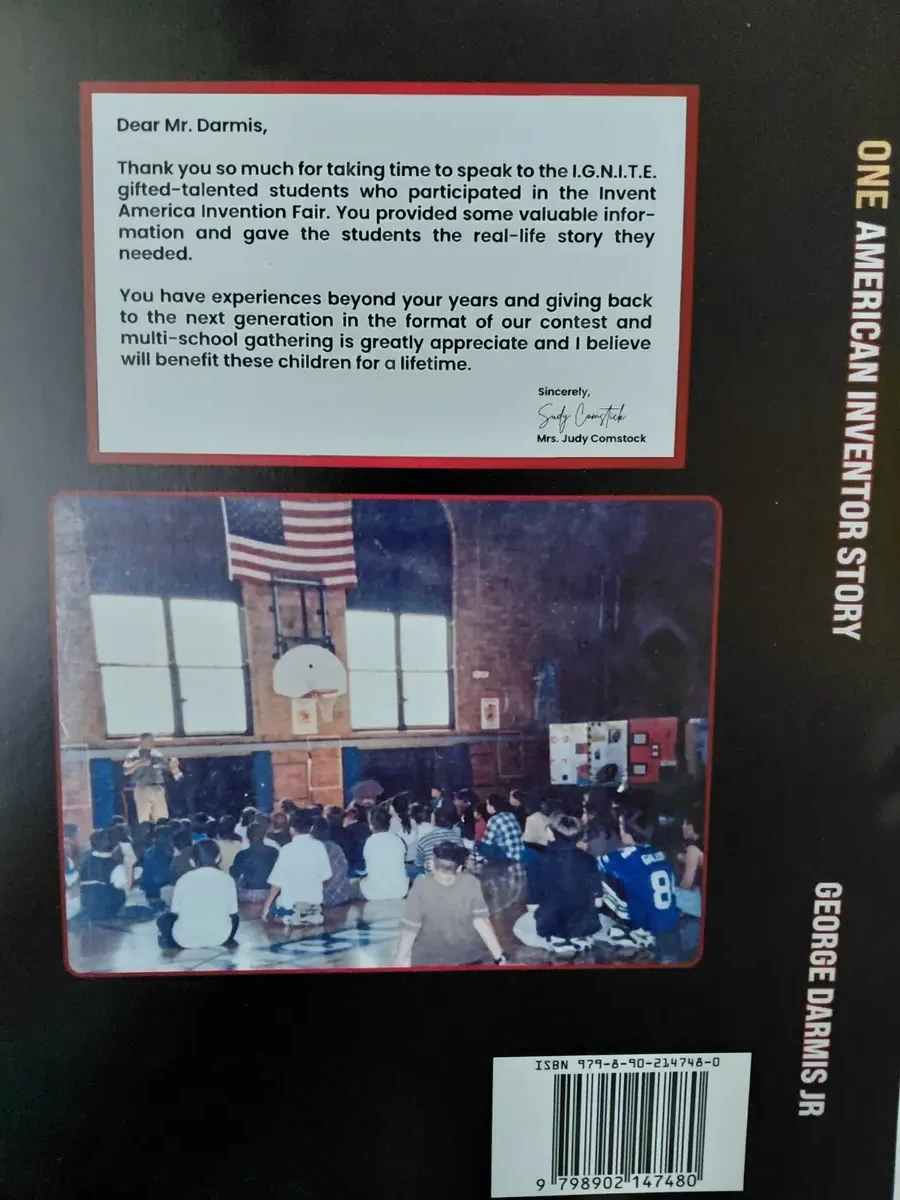 Invent America student event display documenting George Darmis's educational speaking